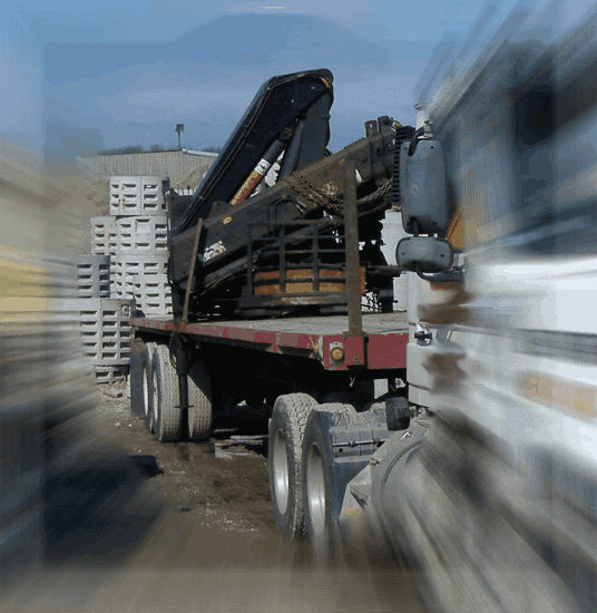Truck carrying industrial equipment