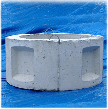 Concrete ring on blue tarp